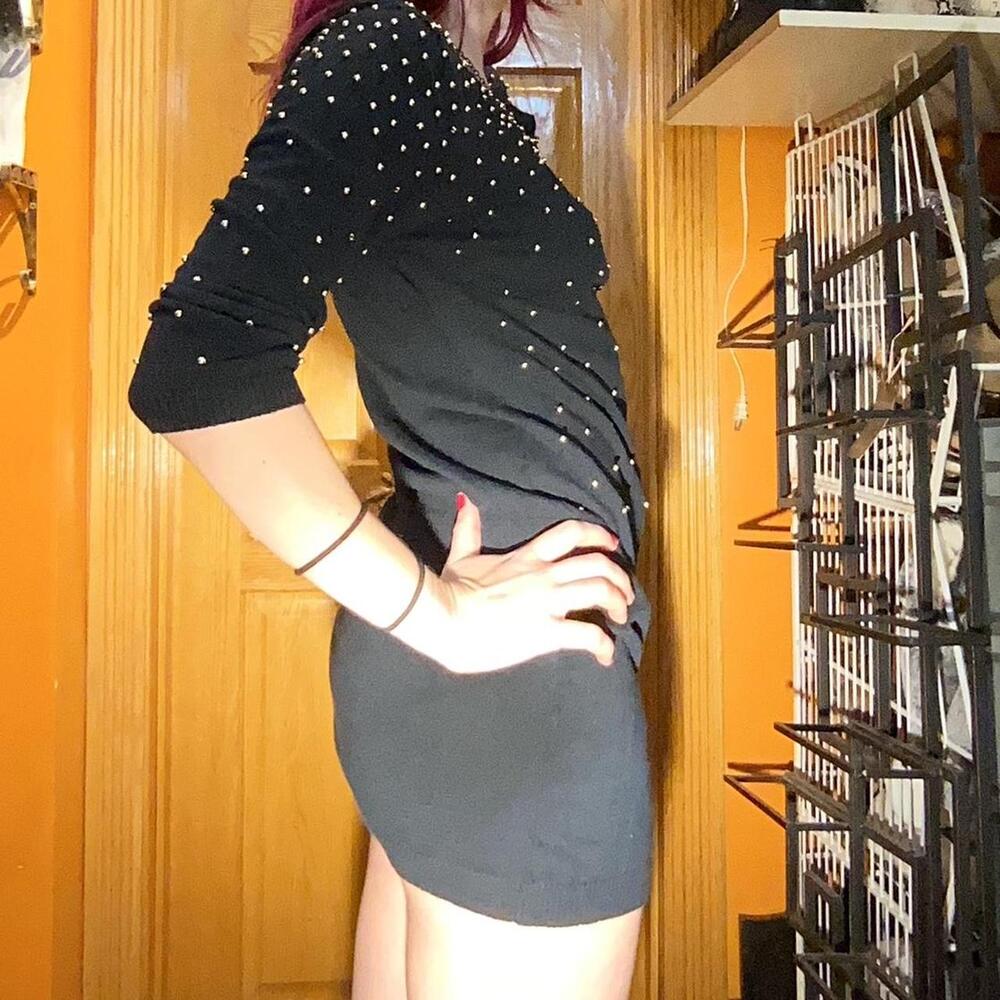 Black knit sweater dress with gold pearls